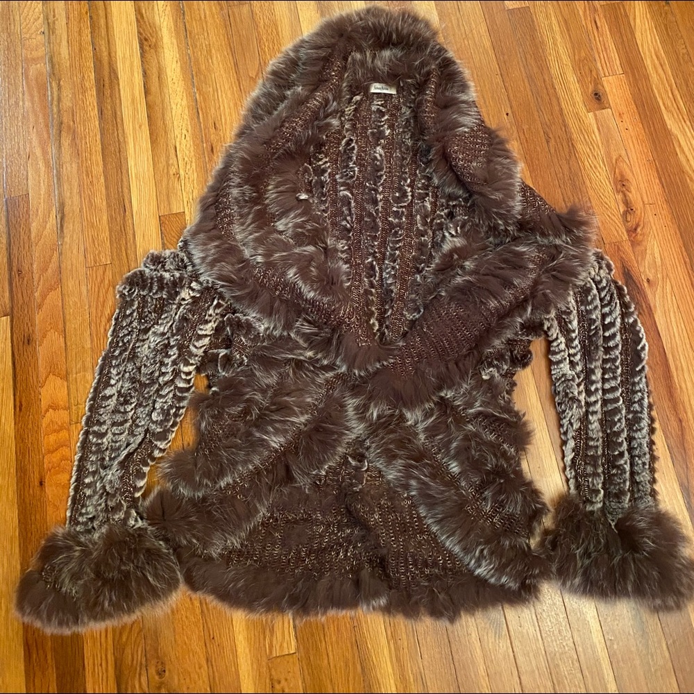 Neiman Marcus rabbit fur throw with sleeves.